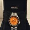 Seiko GMT Sports Watch – Automatic Dual Time Zone Timepiece (orange)